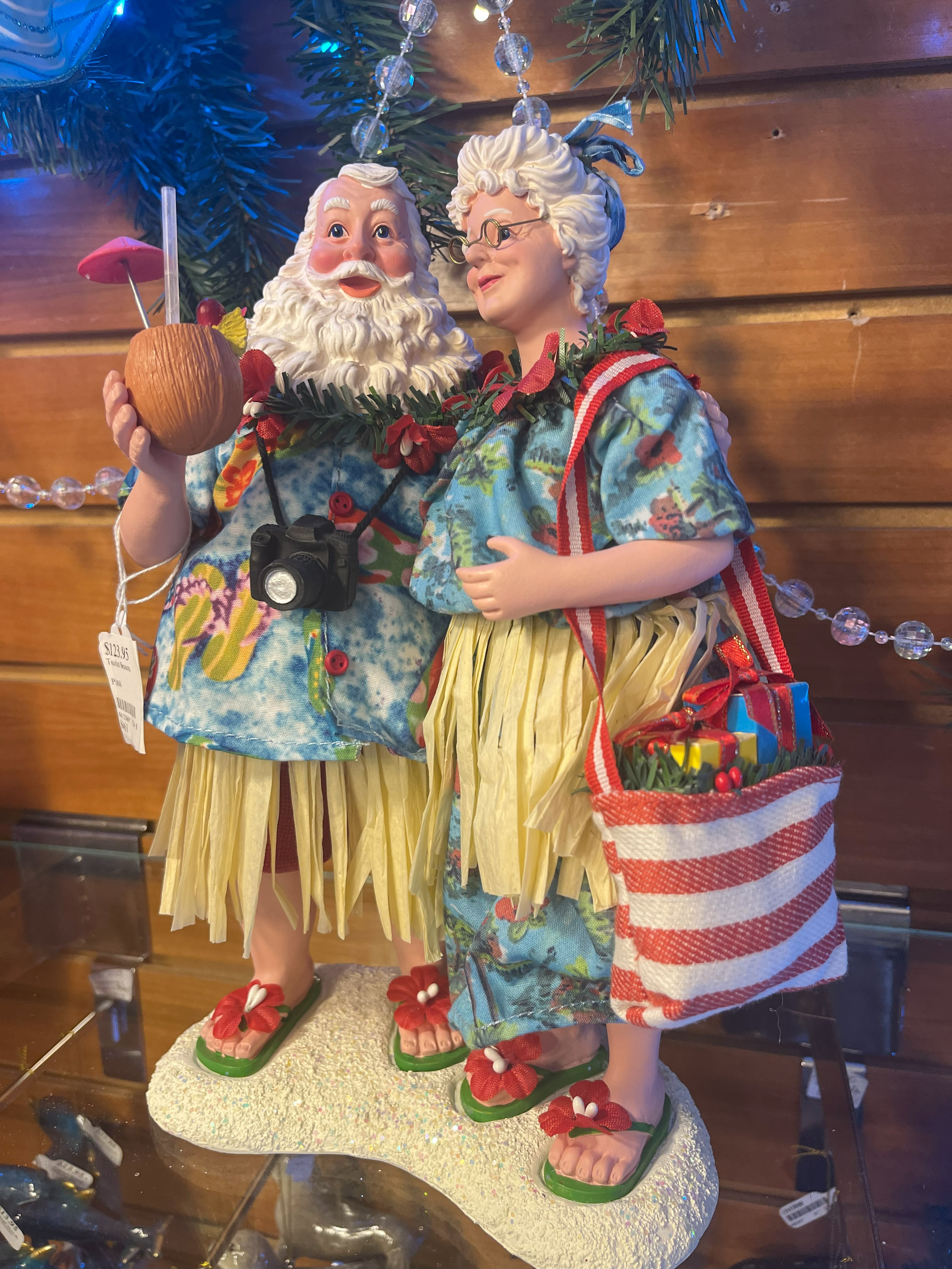 Hula Santa and Mrs Claus on vacation.  Santa Joined the photo Scavenger hunt but said he won't be delivering his photos until Christmas morning.